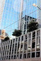 Reflections in the modern glass building across from Civic Square. Wellington, New Zealand.