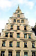 Building with lions, griffins, eagles, & birds on NW corner of Market Square in Wroclaw. Poland.