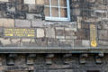 Inscriptions on facade of Museum of Edinburgh. Edinburgh, Scotland.