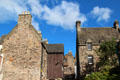 Antique stone buildings on Bakehouse Close at Museum of Edinburgh. Edinburgh, Scotland.