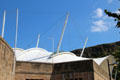 Fabric roof atop stone walls of Our Dynamic Earth. Edinburgh, Scotland.