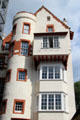Red & white towered building on Royal Mile at corner of Edinburgh Castle. Edinburgh, Scotland