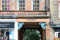 Entrance to Wardrop's Court marked by two dragons on Royal Mile. Edinburgh, Scotland.
