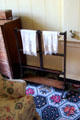 Antique wooden towel rack in bedchamber at Georgian House museum. Edinburgh, Scotland.