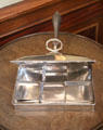 English Old Sheffield Plate cheese toaster in dining room at Georgian House museum. Edinburgh, Scotland.
