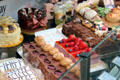 Pastries in bakery shop window. Edinburgh, Scotland.