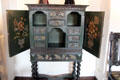 Interior details of Scandinavian bridal cabinet on legs carved with trolls at The Study. Culross, Scotland.
