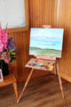 Prince Phillip's paint brushes & easel in Sun lounge on Royal Yacht Britannia. Edinburgh, Scotland.
