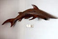 Fish carving gift from Pitcairn Islands in State Dining Room on Royal Yacht Britannia. Edinburgh, Scotland.