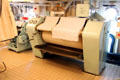 Flatwork ironer in laundry on Royal Yacht Britannia. Edinburgh, Scotland.