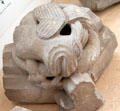 Carved stone vaulting boss with face in museum at Jedburgh Abbey. Jedburgh, Scotland.