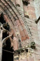Carved arch with head at Melrose Abbey. Melrose, Scotland.
