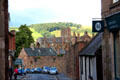 Melrose Abbey ruins rise above Melrose town. Melrose, Scotland.