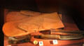 Leather mittens, snow goggles, button & sheath knife belonging to Captain Scott & others at RRS Discovery Museum. Dundee, Scotland.