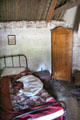 Bed & corner cabinet in Highland cottage at Highland Folk Museum. Newtonmore, Scotland.
