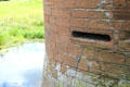 Defense slit in tower at Caerlaverock Castle. Caerlaverock, Scotland.