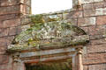 Stone carved allegory of love on facade of Nithsdale Lodging at Caerlaverock Castle. Caerlaverock, Scotland.