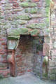 Sculpted fireplace in Nithsdale Lodging at Caerlaverock Castle. Caerlaverock, Scotland.