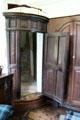 Corner door to hidden spiral staircase in The Hall at Craigievar Castle. Alford, Scotland.