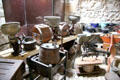 Butter churns in Museum of Farming Life at Pitmedden Gardens. Pitmedden, Scotland.