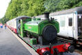Trains pass at rail station at Royal Deeside Railway. Scotland.