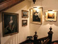 Old masters line staircase at Brodie Castle. Brodie, Scotland.