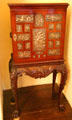Cabinet embossed with metal scenes at Brodie Castle. Brodie, Scotland.