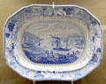 Blue & white oval serving dish showing Avon River scene, made by Bristol Pottery using underglaze transfer-printing process at Bristol Museum & Art Gallery. Bristol, England.