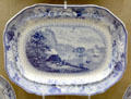 Blue & white oval serving dish showing Avon River scene made by Bristol Pottery using underglaze transfer printing process at Bristol Museum & Art Gallery. Bristol, England.