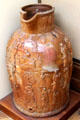 Salt-glazed brown stoneware jug decorated with images of Roman figures made by W & T Powell, Bristol at Bristol Museum & Art Gallery. Bristol, England.