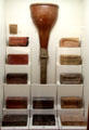 Display of clay fired bricks & salt-glazed stoneware rainwater head & down pipe made in Bristol at Bristol Museum & Art Gallery. Bristol, England.