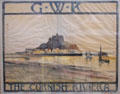 GWR poster advertising "The Cornish Riviera" with image of St Michael's Mount island & castle at STEAM Museum of Great Western Railway. Swindon, England.