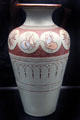 Salopian vase incised with butterflies on light gray & red background by Benthall Pottery at Jackfield Tile Museum. Ironbridge, England.