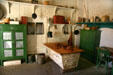Kitchen at Sutter's Fort with sourdough bread bin & food storage. Sacramento, CA.