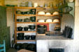 Iron pots & earthenware cooking utensils at Sutter's Fort. Sacramento, CA.