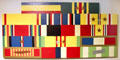 Campaign ribbons spanning WW II through Vietnam of USS Hornet CV-12. Alameda, CA.