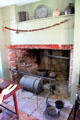 Kitchen fireplace with utensils at Dr. Hezekiah Chaffee House. Windsor, CT.