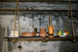 Hanging shelf with Spanish colonial-style pottery in The Oldest House. St Augustine, FL.