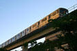 Miami Metrorail train on elevated track. Miami, FL.