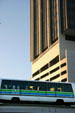 Miami Metromover car passes highrise. Miami, FL.
