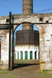 Smokestack through arch at Roundhouse Railroad Museum. Savannah, GA.