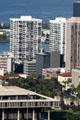 Harbor Square Towers over heritage buildings surrounding Hawaii State Capitol. Honolulu, HI.