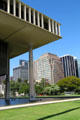 Alii Place & black Pauahi Tower framed by Hawaii state legislature building. Honolulu, HI.