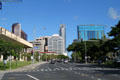 Leiopapa A Kamehameha State Office Tower beyond State Capitol. Honolulu, HI.