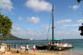 Maita'i Catamaran with Diamond Head in distance. Waikiki, HI.