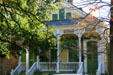 Yellow & green double shotgun houses. New Orleans, LA.