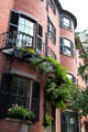 Curved brick fronts & iron balconies on Chestnut St. in Beacon Hill. Boston, MA.