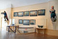 Ship figureheads & paintings in East India Marine Hall at Peabody Essex Museum. Salem, MA.