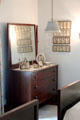 Dresser with baby portraits of Kennedy children in master bedroom at John F. Kennedy NHS. Boston, MA.