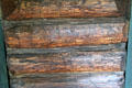 Log wall using insect tracks as decorative element at Stickley Museum at Craftsman Farms. Morris Plains, NJ.